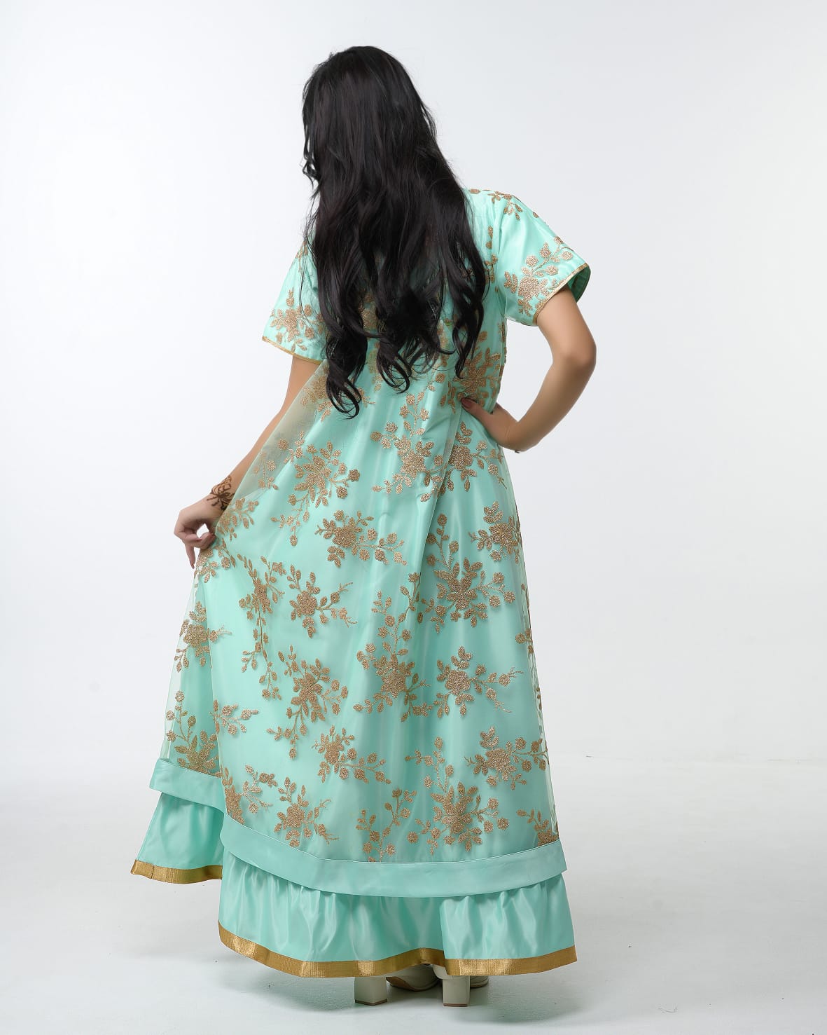 Luxurious Satin dress with Tulle embroidered using golden threads and studded with crystals